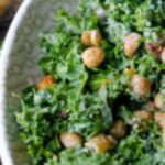 A bowl of kale and chickpeas - representing foods that can antagonise Haemochromatosis and iron overload