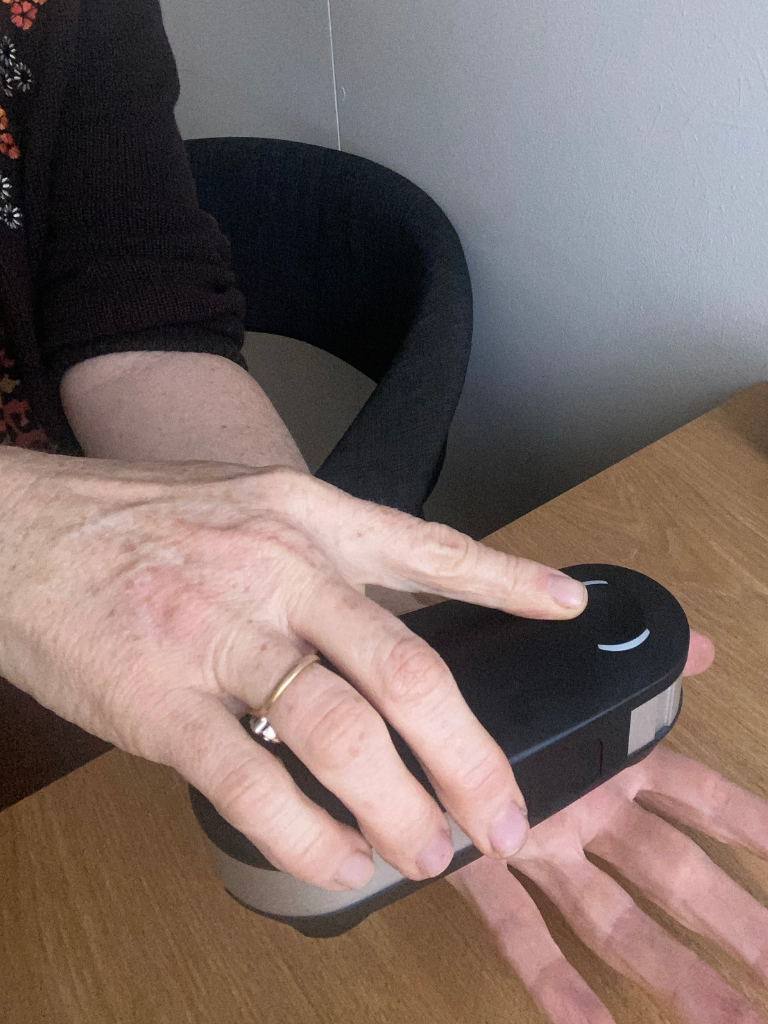 Oligoscan been placed on a hand for a test